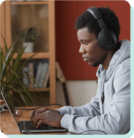 Teen using a laptop