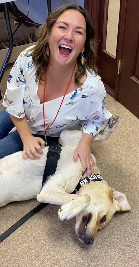 Susie's Place forensic interview program manager Anna Cope and Hunter share a laugh.